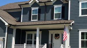Blue house with American flag
