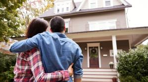 Couple looking at their home